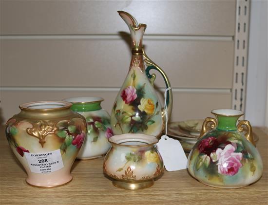 A group of Royal Worcester rose decorated vases and four blush ivory plates